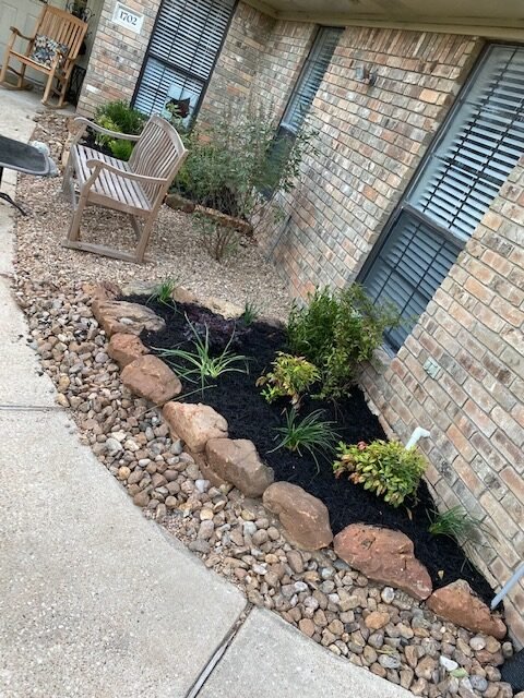 Professional planting bed and landscape installation by Rockin' D Services in Huntsville TX