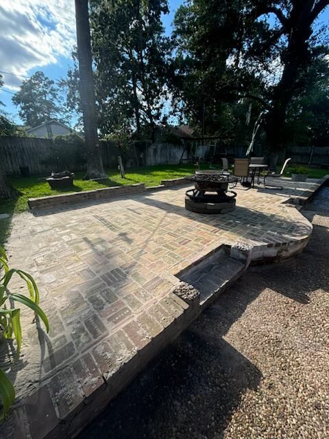 Custom brick patio and outdoor entertaining space built by Rockin' D Services in Huntsville TX