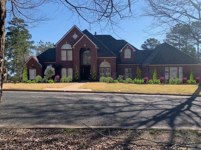 Front yard landscaping transformation and 3D design by Rockin' D Services in Huntsville TX
