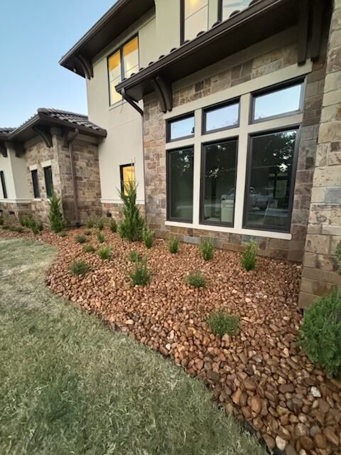 Professional rock landscaping and planting bed installation in East Texas by Rockin' D Services