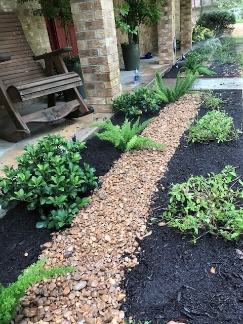 Drainage solutions Huntsville TX dry creek installation by Rockin' D Services